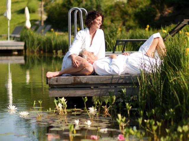 Couple on the jetty in the relaxation garden