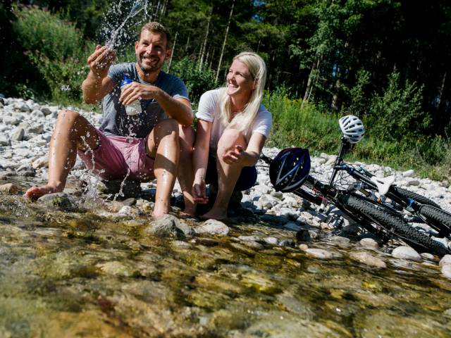 couple taking a break during the bike ride